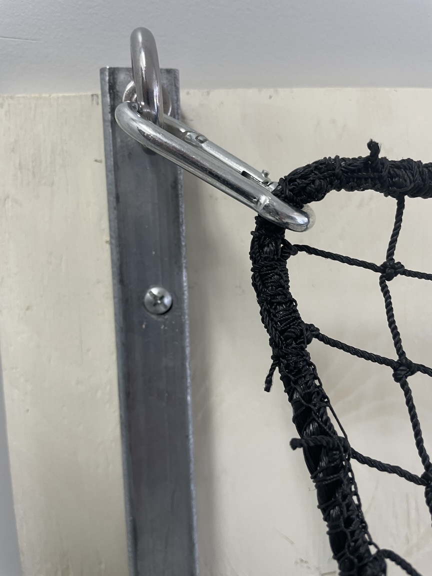 Window protection against golf balls
